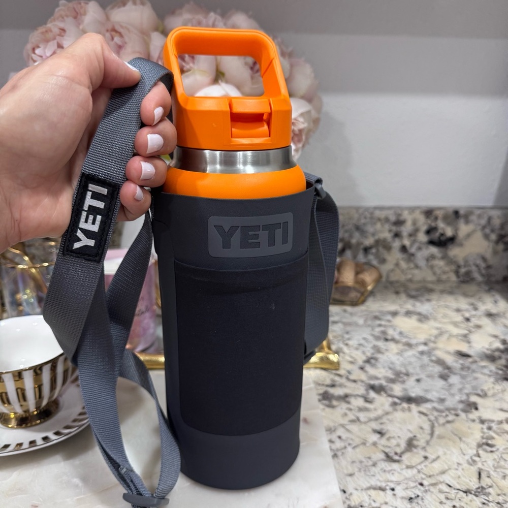 YETI Vibrant Orange and Sleek Black Bottle